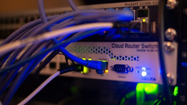 Ethernet networking equipment illustrating DNS and internet connectivity troubleshooting in Windows 11